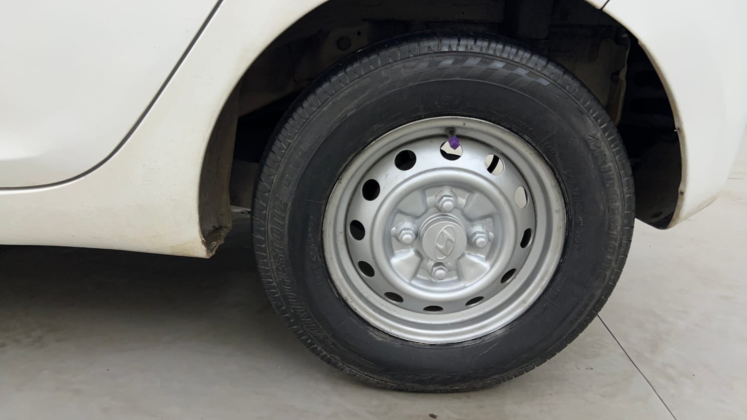 Used 2014 Hyundai Eon Era + Petrol Manual tyres LEFT REAR TYRE RIM VIEW
