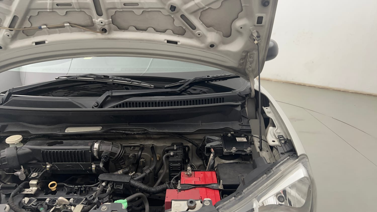 Used 2022 Maruti Suzuki S-Presso VXi (O) Petrol Manual engine ENGINE LEFT SIDE HINGE & APRON VIEW