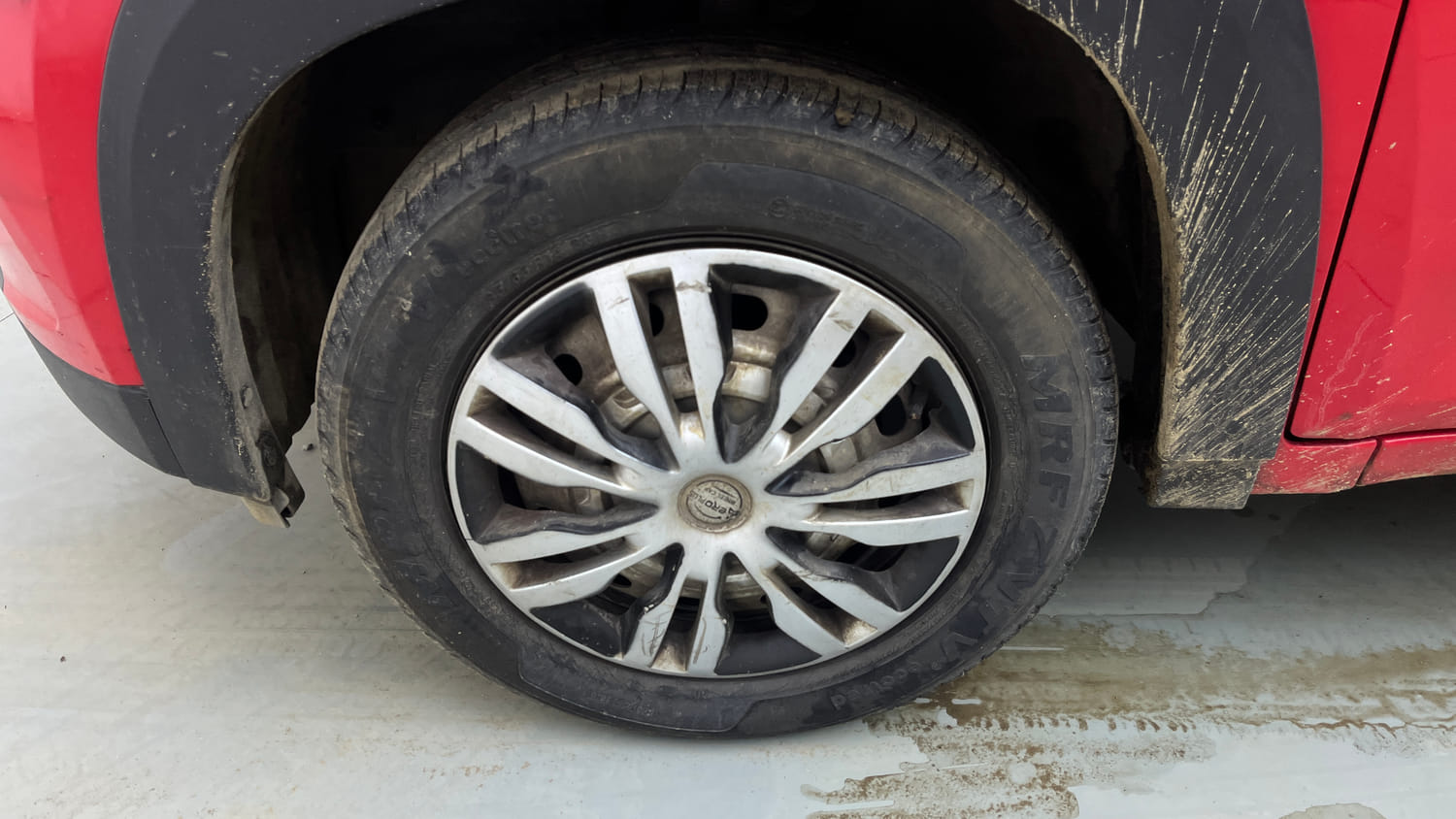 Used 2021 Mahindra KUV100 NXT K2 Plus 6 STR Petrol Manual tyres LEFT FRONT TYRE RIM VIEW