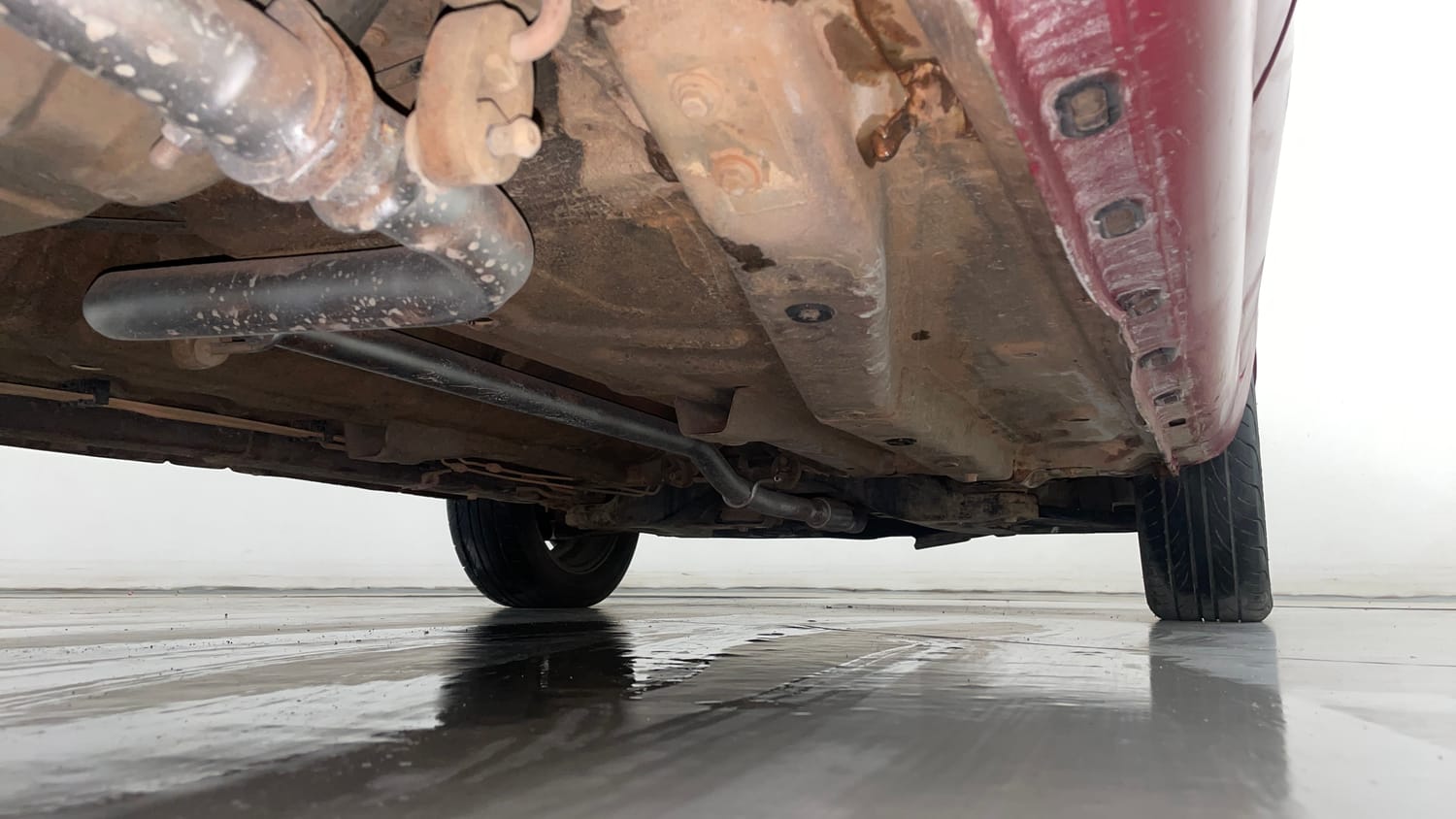 Used 2014 Tata Zest XT Petrol Petrol Manual extra REAR RIGHT UNDERBODY VIEW