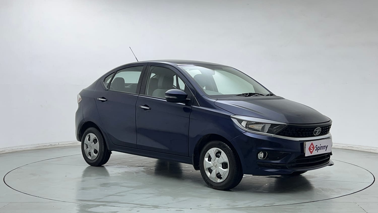 Used 2021 Tata Tigor XZ Petrol Manual exterior RIGHT FRONT CORNER VIEW