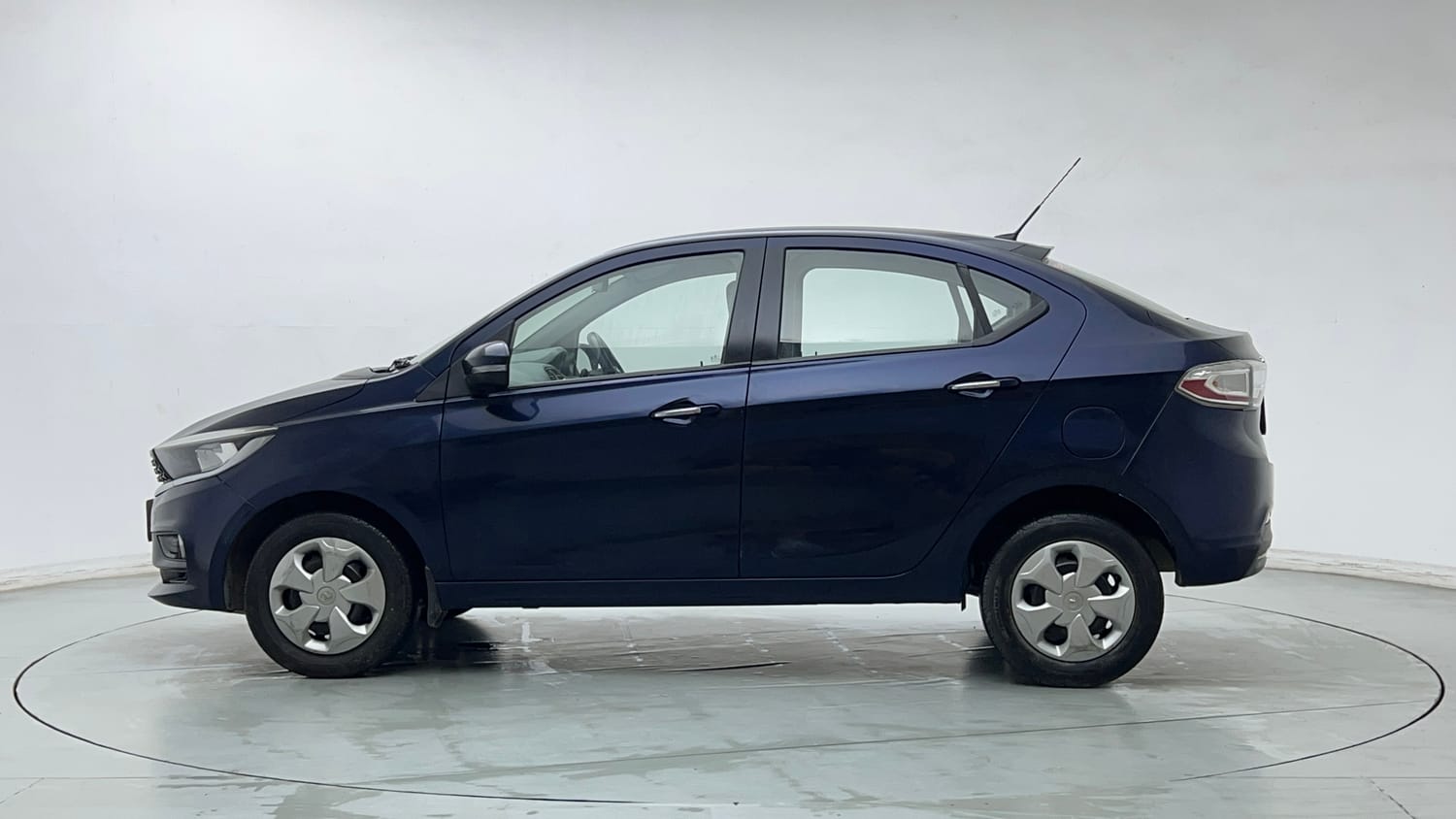 Used 2021 Tata Tigor XZ Petrol Manual exterior LEFT SIDE VIEW