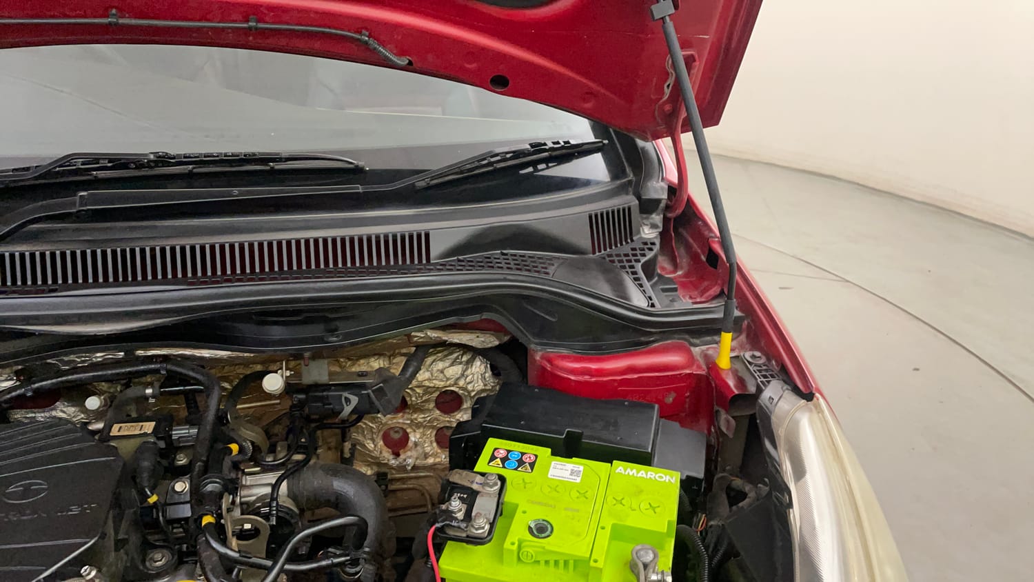 Used 2014 Tata Zest XT Petrol Petrol Manual engine ENGINE LEFT SIDE HINGE & APRON VIEW