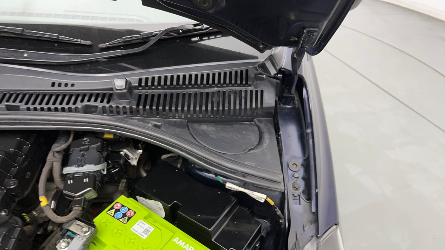 Used 2021 Tata Tigor XZ Petrol Manual engine ENGINE LEFT SIDE HINGE & APRON VIEW