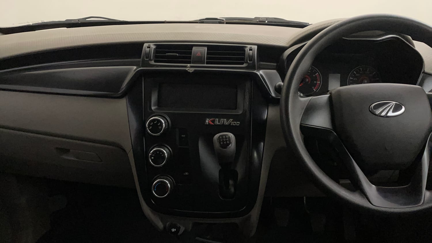 Used 2016 Mahindra KUV100 K4 6 STR Petrol Manual interior MUSIC SYSTEM & AC CONTROL VIEW