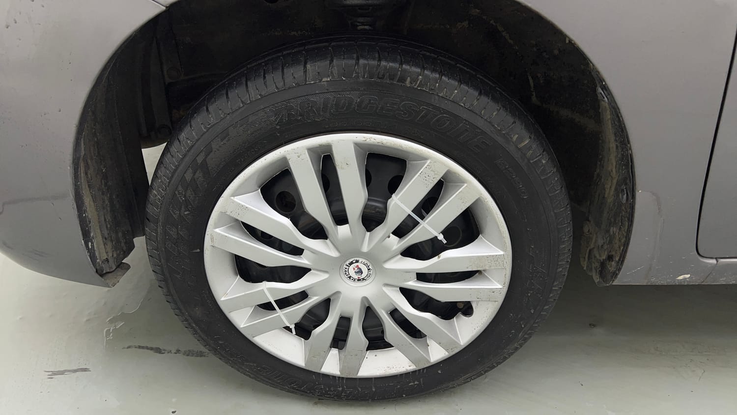 Used 2013 Maruti Suzuki Wagon R VXI Petrol Manual tyres LEFT FRONT TYRE RIM VIEW