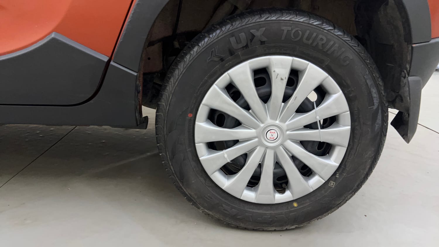 Used 2016 Mahindra KUV100 K6+ 6 STR Petrol Manual tyres LEFT REAR TYRE RIM VIEW