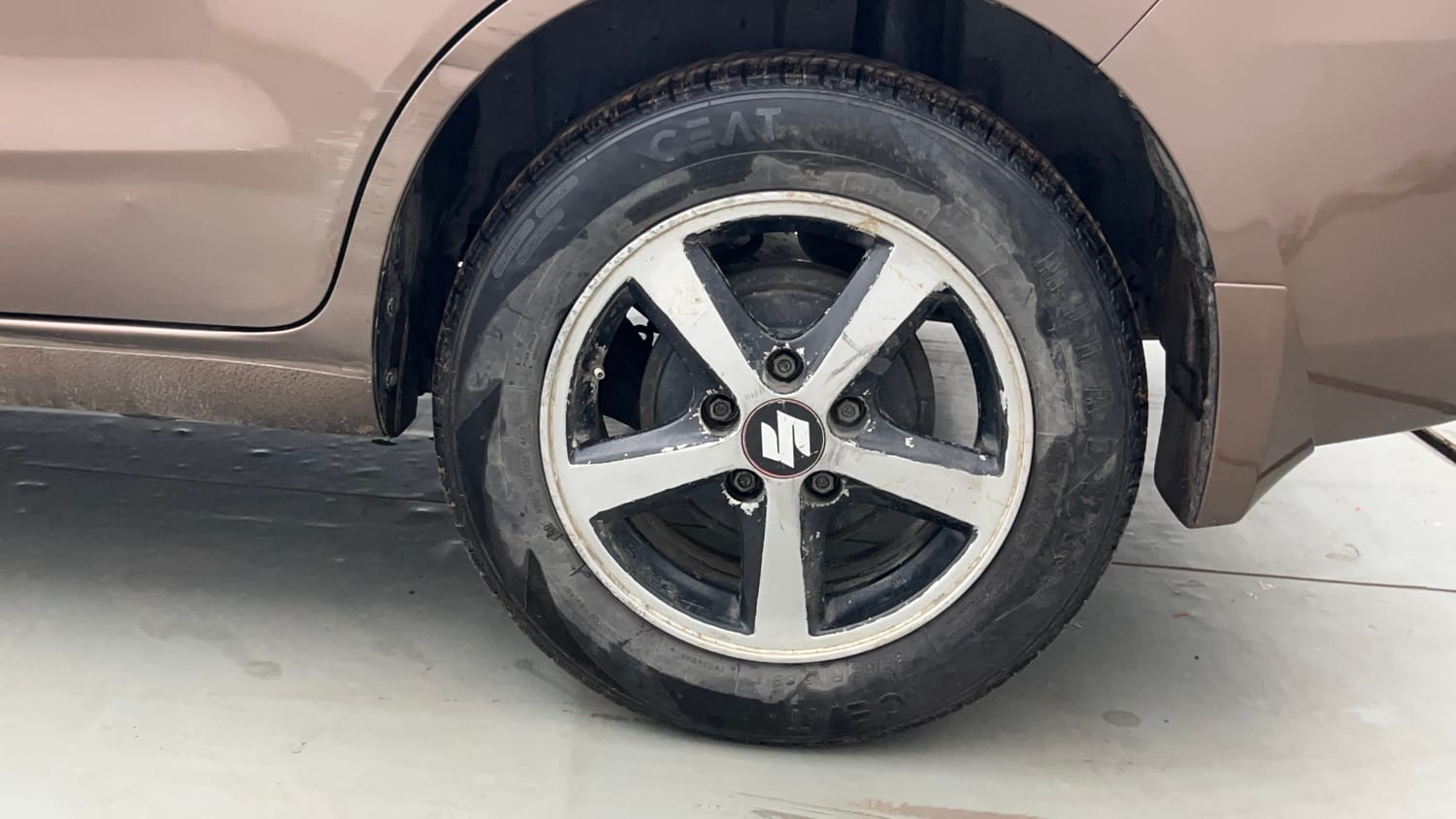 Used 2013 Maruti Suzuki Ertiga Vxi Petrol Manual tyres LEFT REAR TYRE RIM VIEW