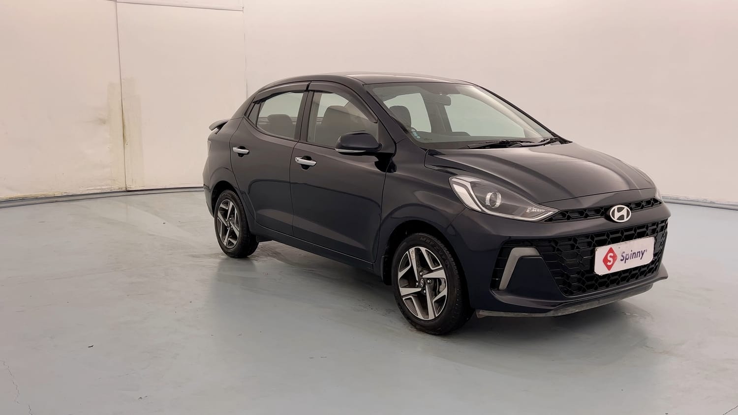 Used 2023 Hyundai Aura SX 1.2 (O) Petrol Petrol Manual exterior RIGHT FRONT CORNER VIEW
