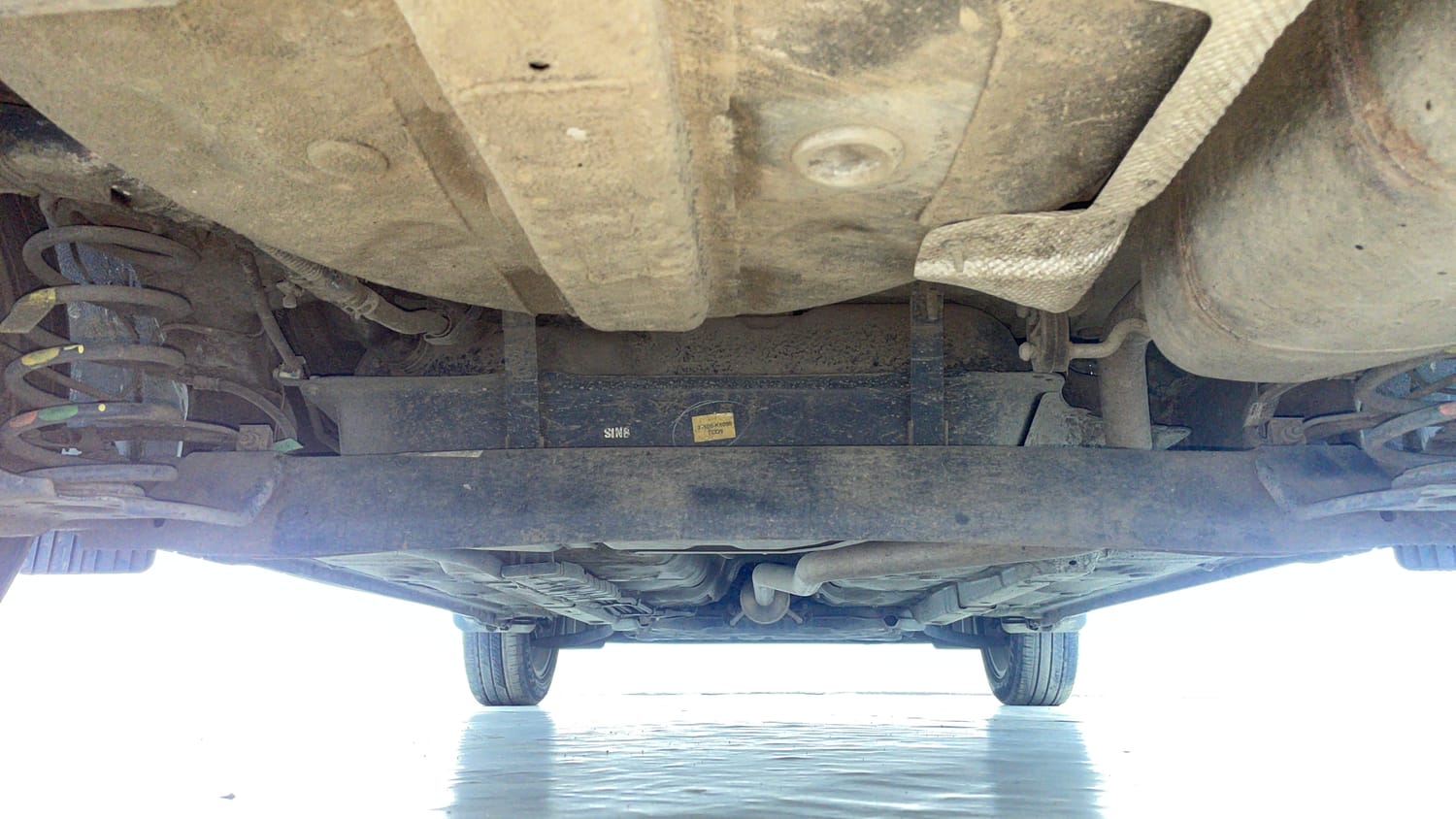 Used 2023 Hyundai Aura SX 1.2 CNG Cng Manual extra REAR UNDERBODY VIEW (TAKEN FROM REAR)