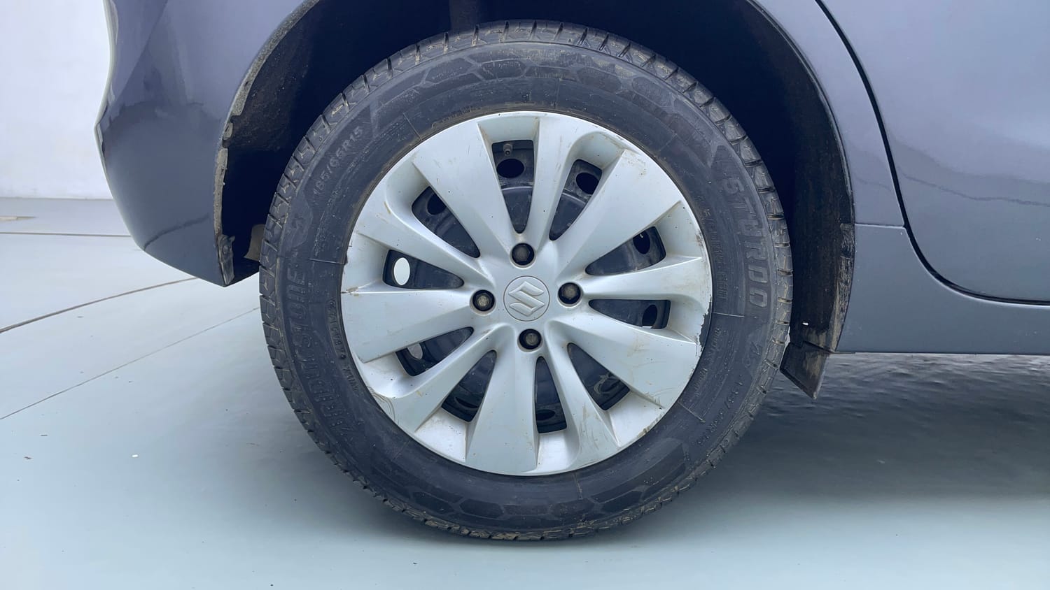 Used 2016 Maruti Suzuki Baleno Delta 1.2 Petrol Manual tyres RIGHT REAR TYRE RIM VIEW