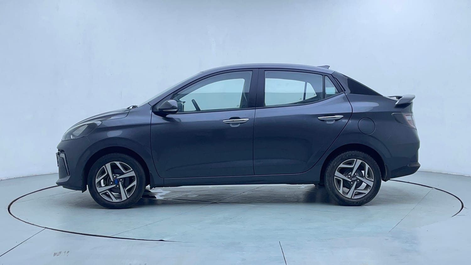 Used 2023 Hyundai Aura SX 1.2 CNG Cng Manual exterior LEFT SIDE VIEW