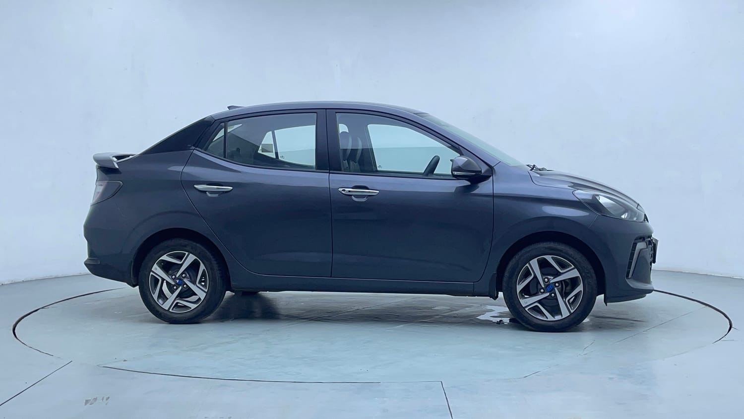Used 2023 Hyundai Aura SX 1.2 CNG Cng Manual exterior RIGHT SIDE VIEW