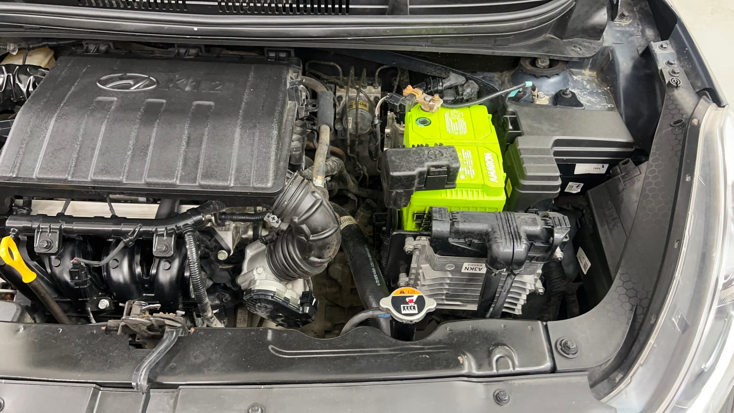 Used 2022 Hyundai Grand i10 Nios Asta AMT 1.2 Kappa VTVT Petrol Automatic engine ENGINE LEFT SIDE VIEW