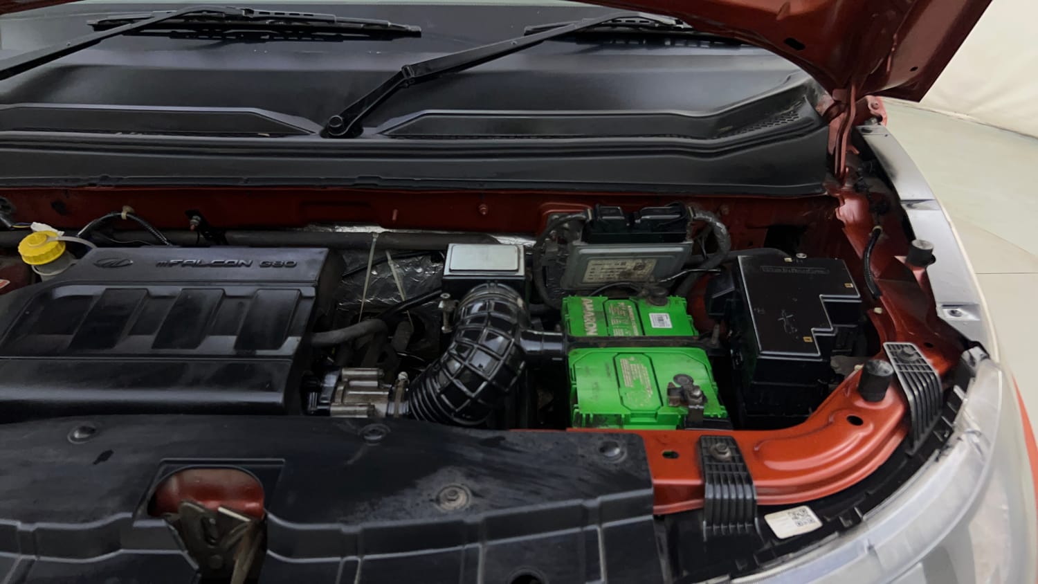 Used 2016 Mahindra KUV100 K6+ 6 STR Petrol Manual engine ENGINE LEFT SIDE HINGE & APRON VIEW