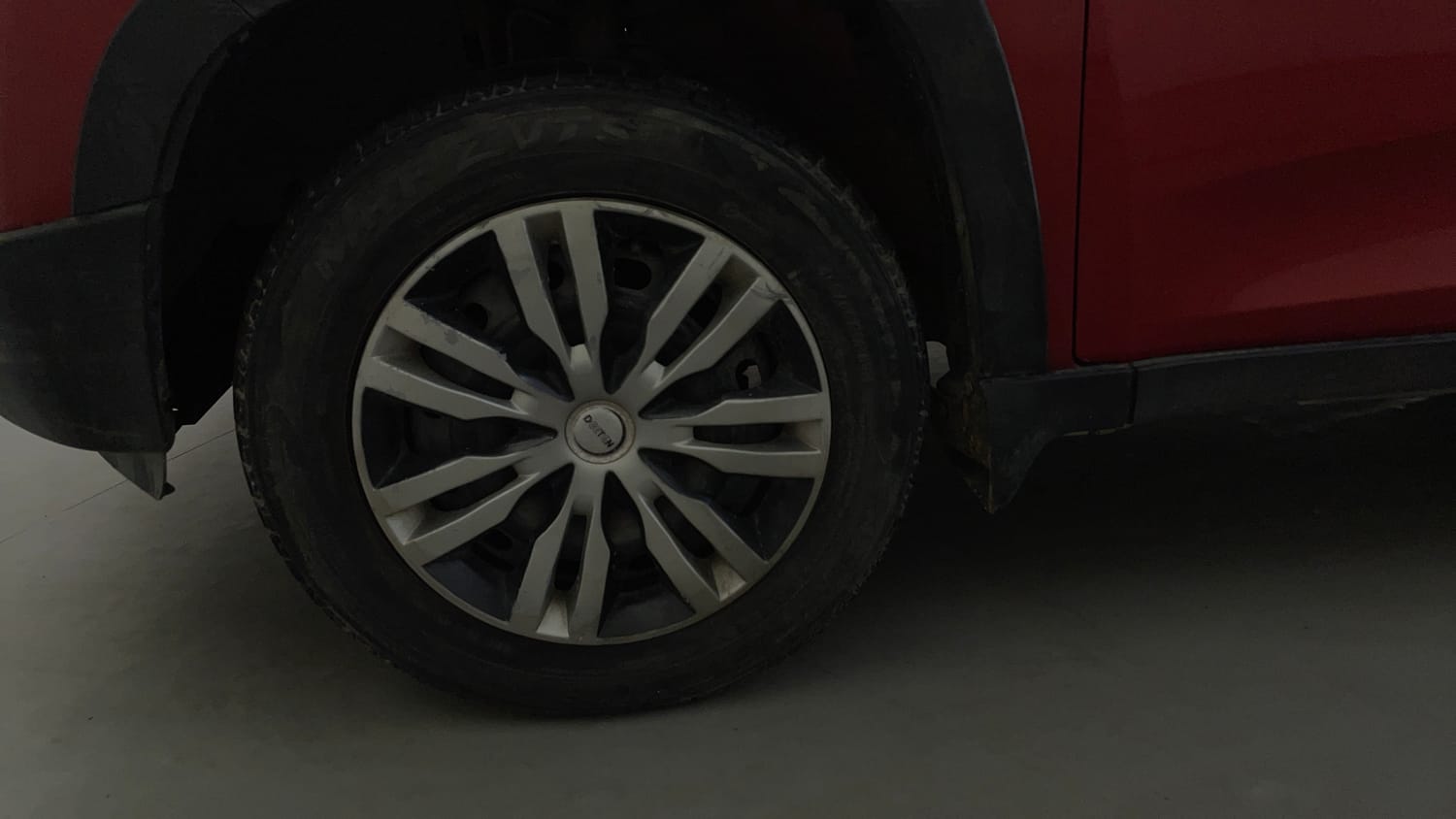 Used 2016 Mahindra KUV100 K4 6 STR Petrol Manual tyres LEFT FRONT TYRE RIM VIEW