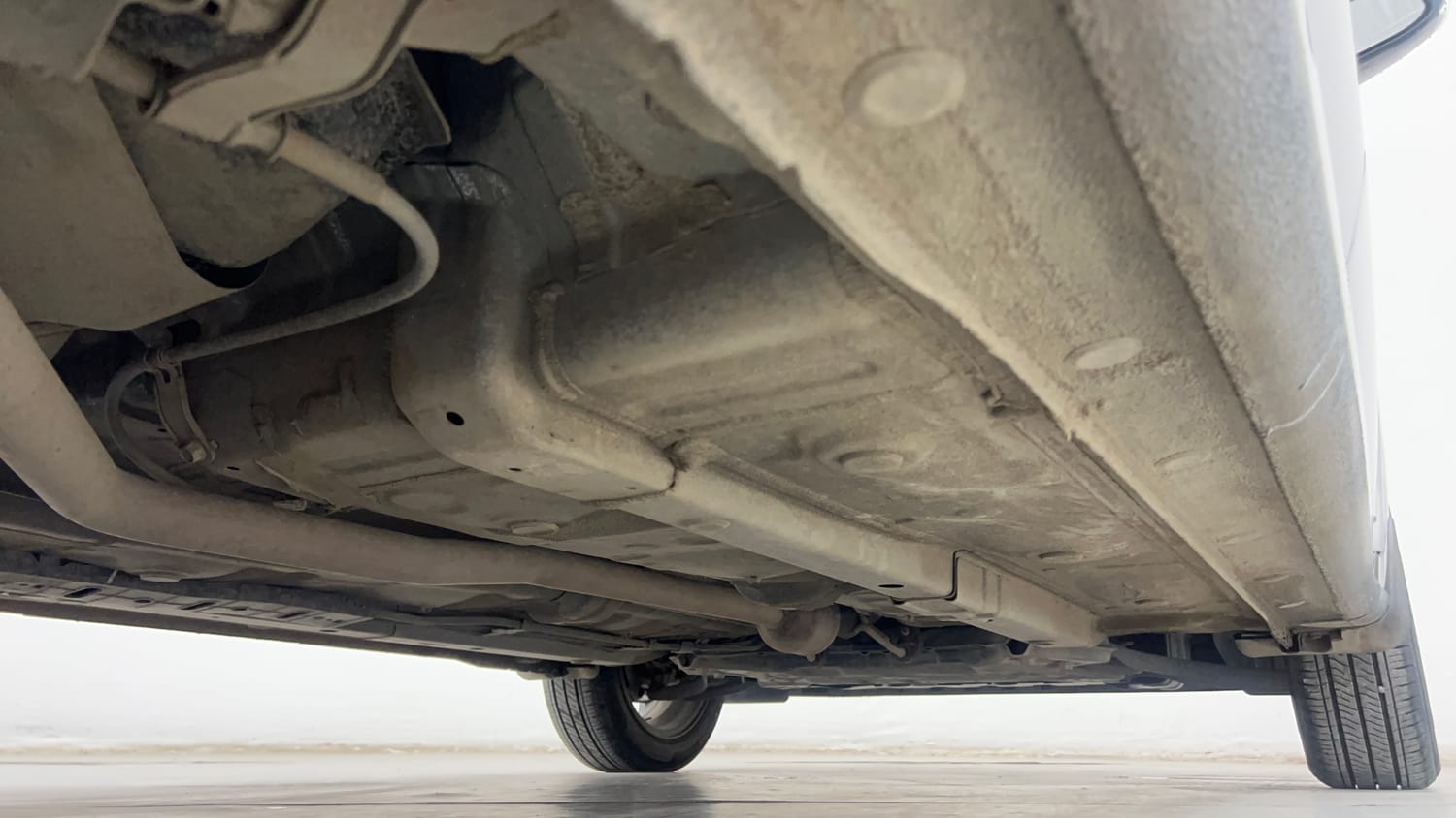 Used 2023 Hyundai Aura SX 1.2 CNG Cng Manual extra REAR RIGHT UNDERBODY VIEW