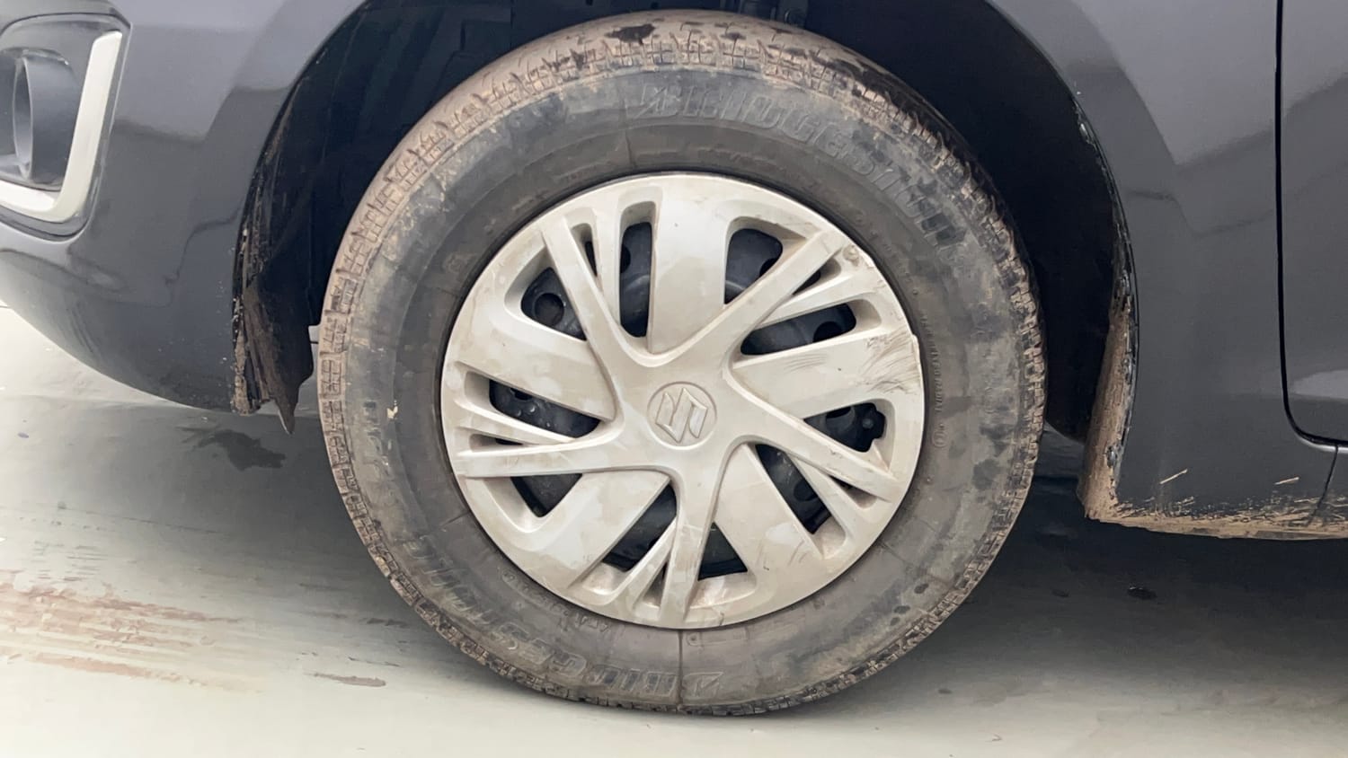 Used 2016 Maruti Suzuki Swift VXi Petrol Manual tyres LEFT FRONT TYRE RIM VIEW