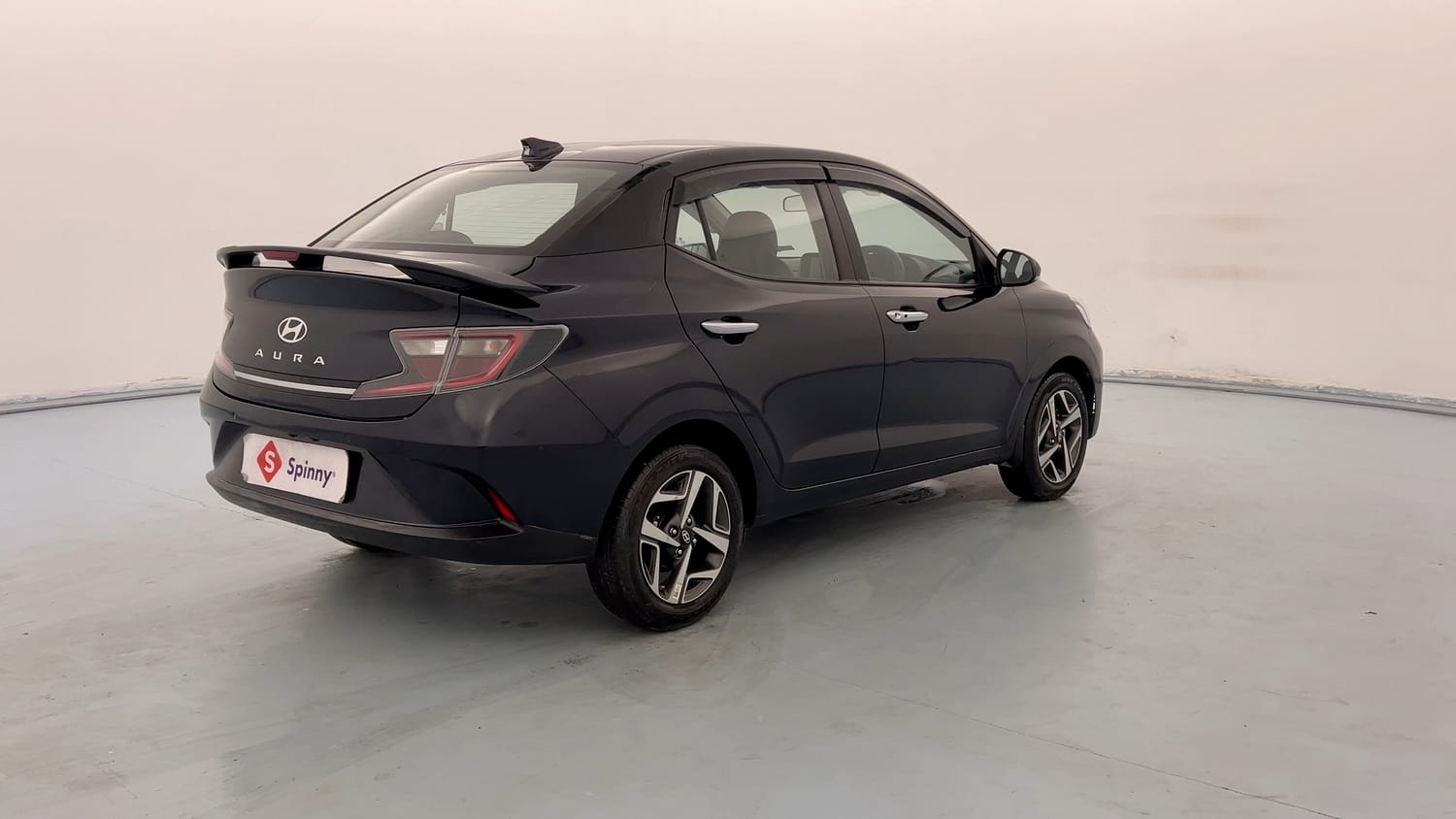 Used 2023 Hyundai Aura SX 1.2 (O) Petrol Petrol Manual exterior RIGHT REAR CORNER VIEW