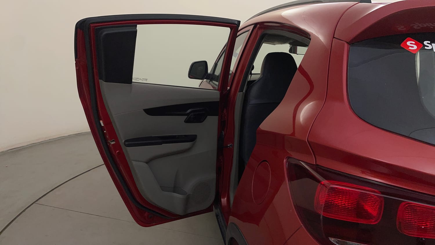 Used 2016 Mahindra KUV100 K4 6 STR Petrol Manual interior LEFT REAR DOOR OPEN VIEW