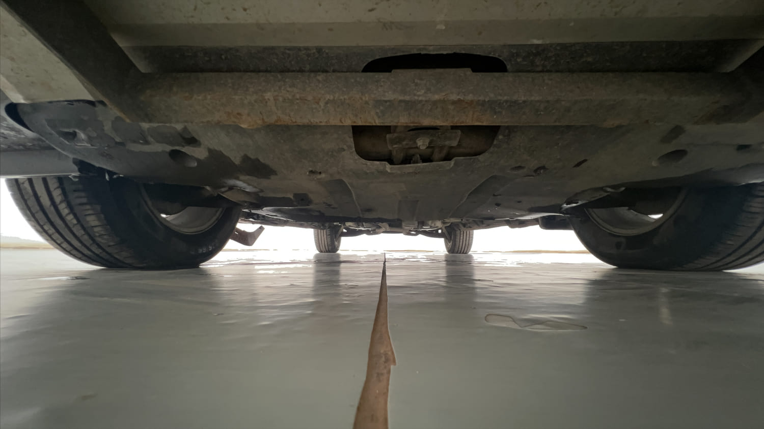 Used 2017 Mahindra XUV500 W10 AT Black Interiors Diesel Automatic extra FRONT LEFT UNDERBODY VIEW