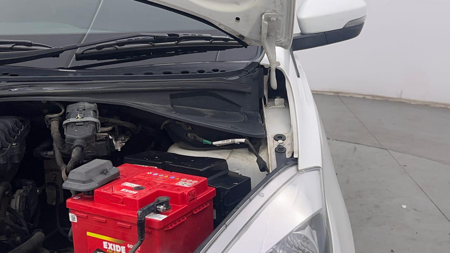 Used 2019 Tata Tiago Revotron XZ Petrol Manual engine ENGINE LEFT SIDE HINGE & APRON VIEW