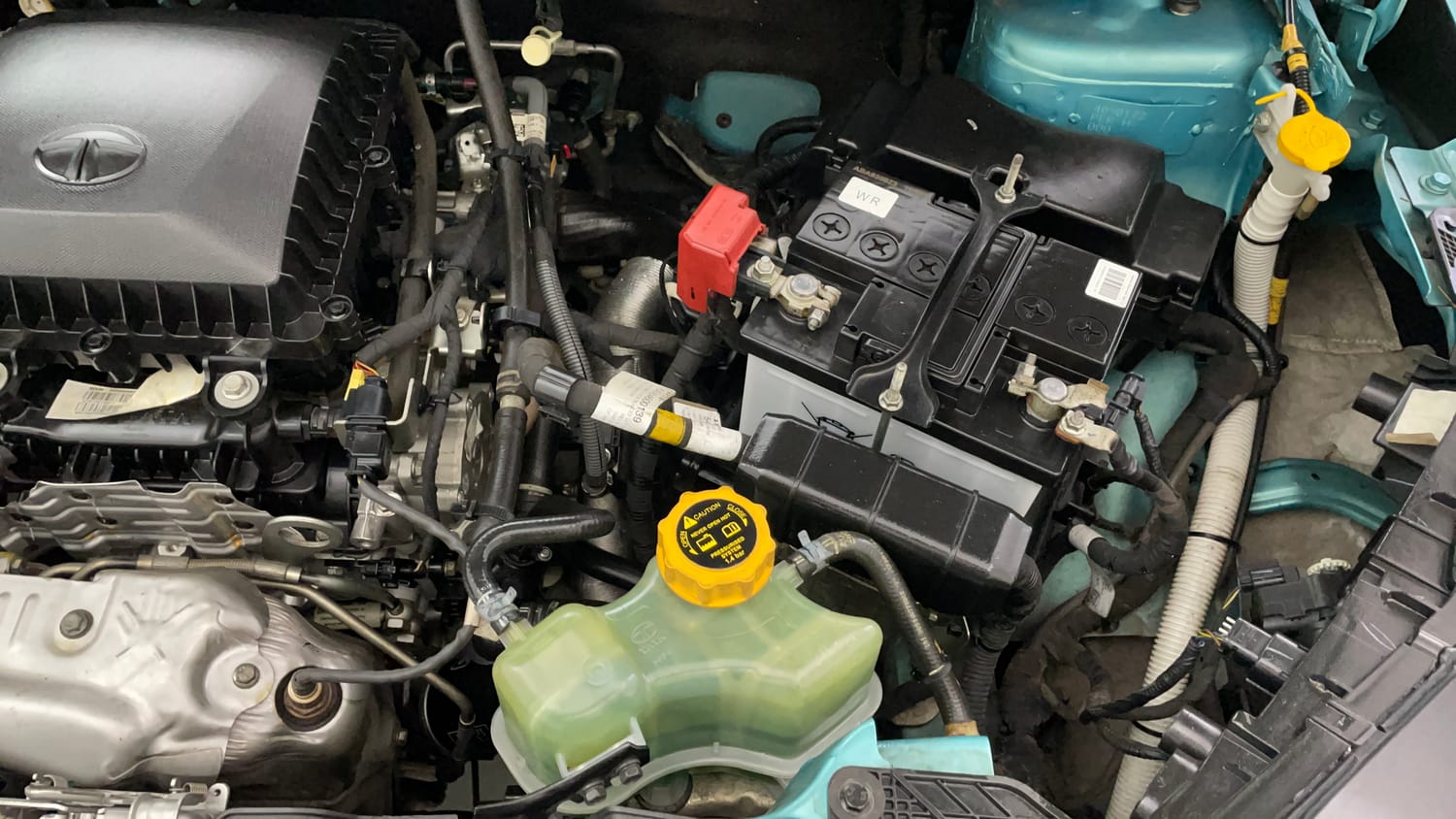 Used 2023 Tata Nexon Creative Plus S 1.2 Revotron Petrol 7DCA DT Petrol Automatic engine ENGINE LEFT SIDE VIEW