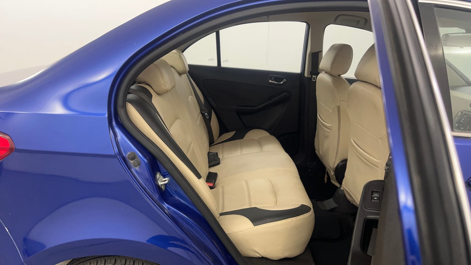 Used 2015 Tata Zest XT Petrol Petrol Manual interior RIGHT SIDE REAR DOOR CABIN VIEW