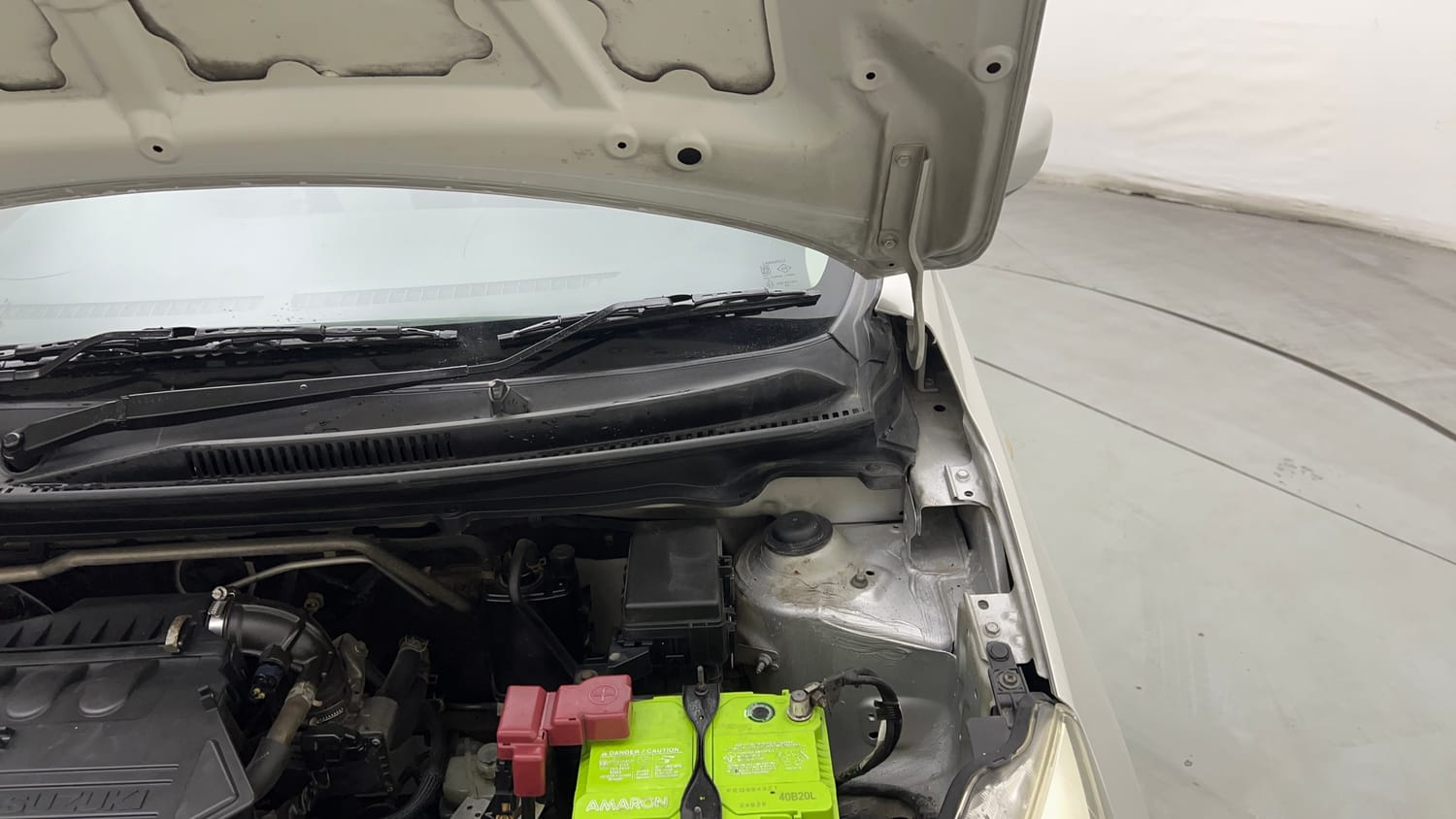 Used 2014 Maruti Suzuki Celerio VXi AMT Petrol Automatic engine ENGINE LEFT SIDE HINGE & APRON VIEW