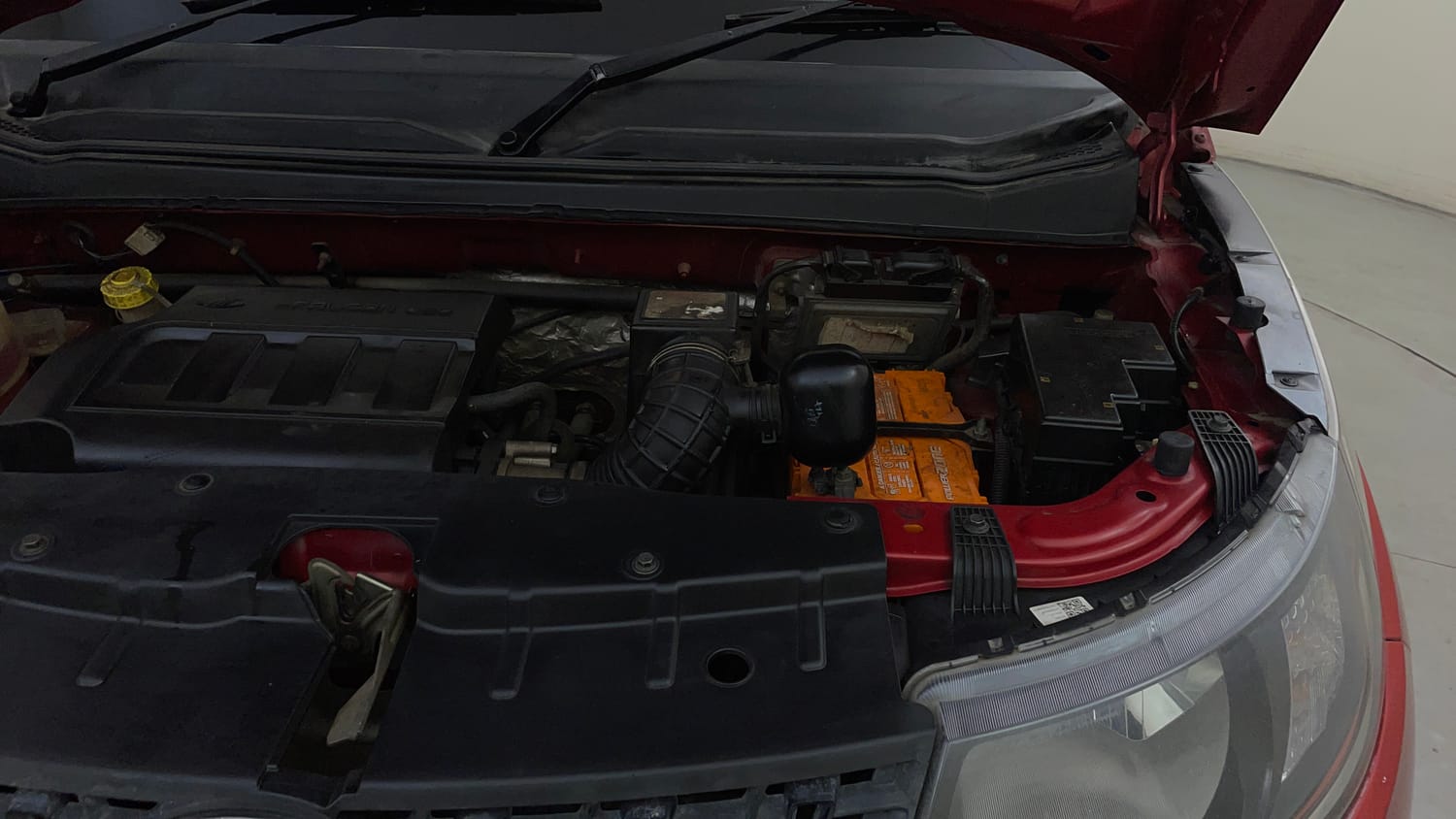 Used 2016 Mahindra KUV100 K4 6 STR Petrol Manual engine ENGINE LEFT SIDE VIEW