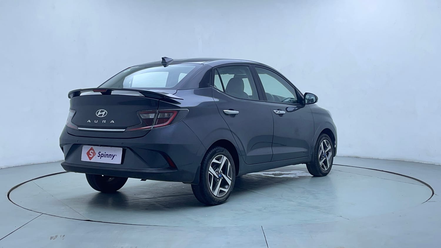 Used 2023 Hyundai Aura SX 1.2 CNG Cng Manual exterior RIGHT REAR CORNER VIEW