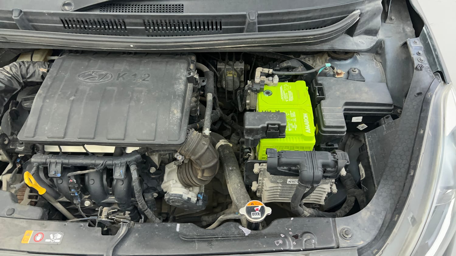 Used 2021 Hyundai Grand i10 Nios Sportz AMT 1.2 Kappa VTVT Petrol Automatic engine ENGINE LEFT SIDE VIEW