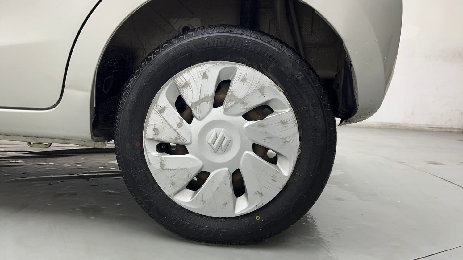 Used 2014 Maruti Suzuki Celerio VXi AMT Petrol Automatic tyres LEFT REAR TYRE RIM VIEW