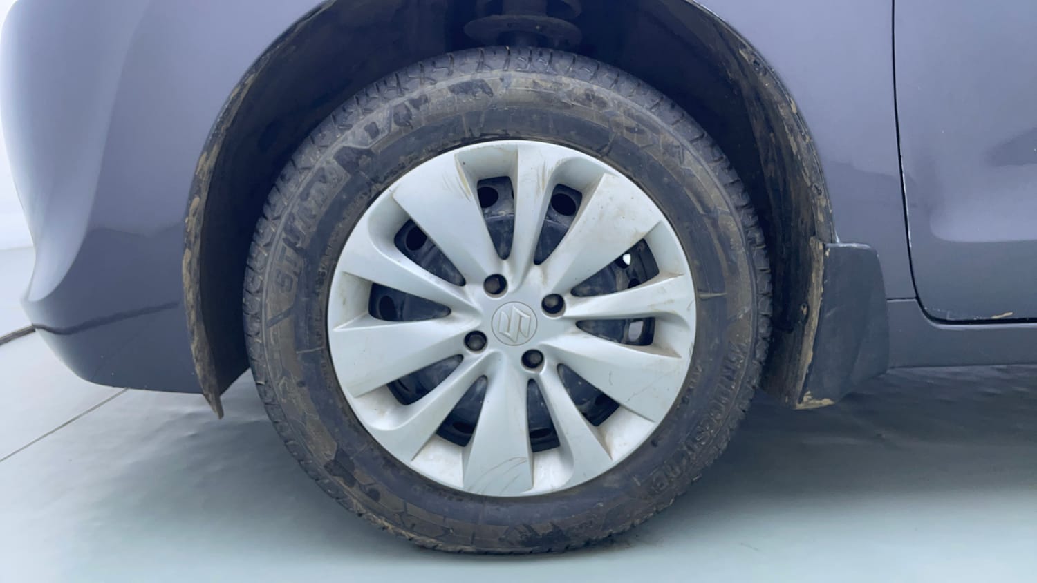 Used 2016 Maruti Suzuki Baleno Delta 1.2 Petrol Manual tyres LEFT FRONT TYRE RIM VIEW