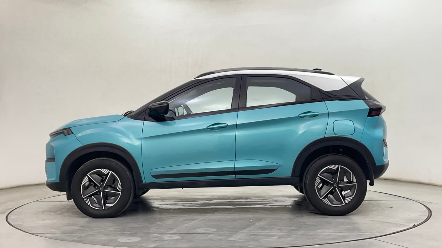 Used 2023 Tata Nexon Creative Plus S 1.2 Revotron Petrol 7DCA DT Petrol Automatic exterior LEFT SIDE VIEW