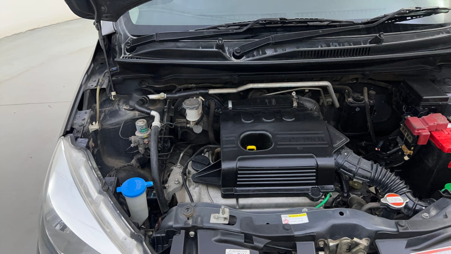 Used 2017 Maruti Suzuki Celerio VXi Petrol Manual engine ENGINE RIGHT SIDE HINGE & APRON VIEW