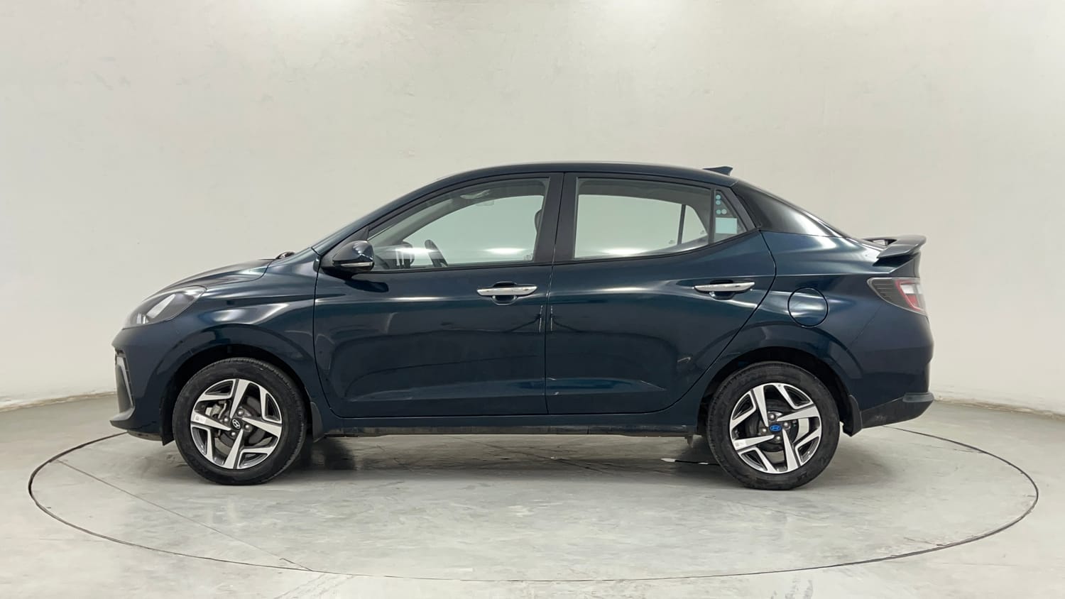 Used 2023 Hyundai Aura SX 1.2 CNG Cng Manual exterior LEFT SIDE VIEW