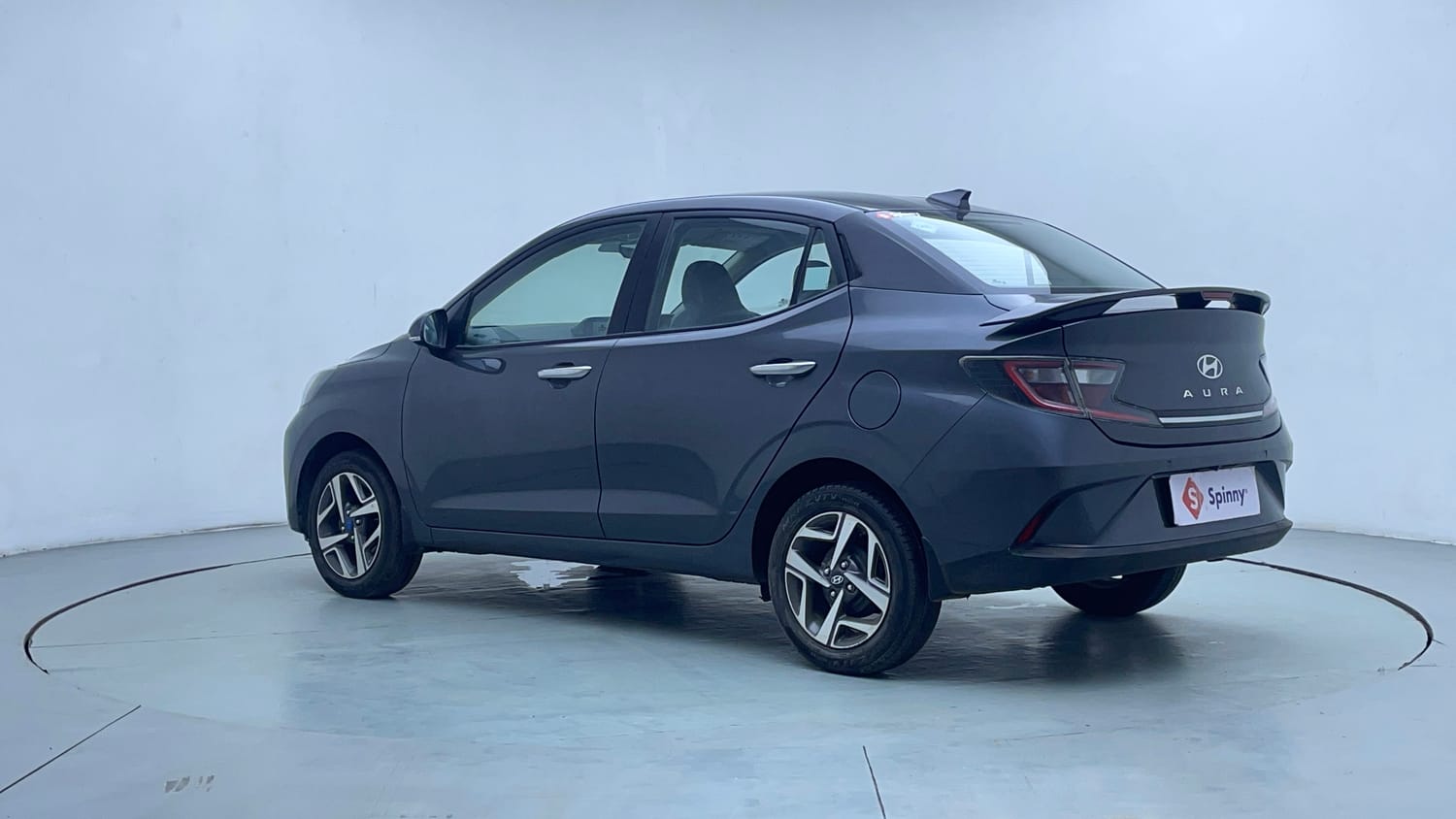 Used 2023 Hyundai Aura SX 1.2 CNG Cng Manual exterior LEFT REAR CORNER VIEW