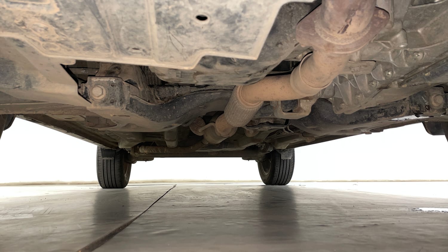 Used 2023 Tata Nexon Creative Plus S 1.2 Revotron Petrol 7DCA DT Petrol Automatic extra FRONT LEFT UNDERBODY VIEW