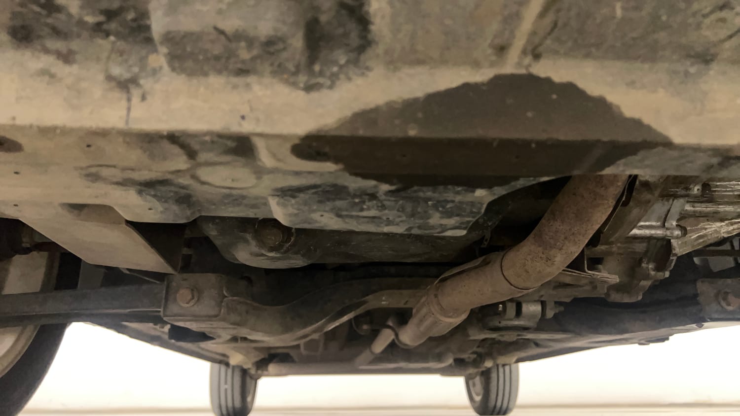 Used 2015 Tata Zest XT Petrol Petrol Manual extra FRONT LEFT UNDERBODY VIEW