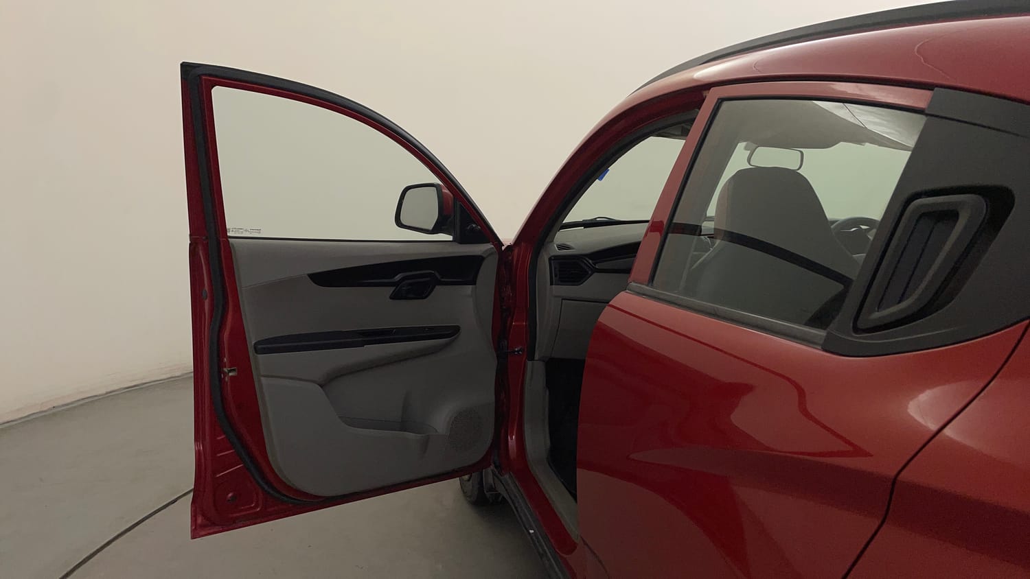 Used 2016 Mahindra KUV100 K4 6 STR Petrol Manual interior LEFT FRONT DOOR OPEN VIEW