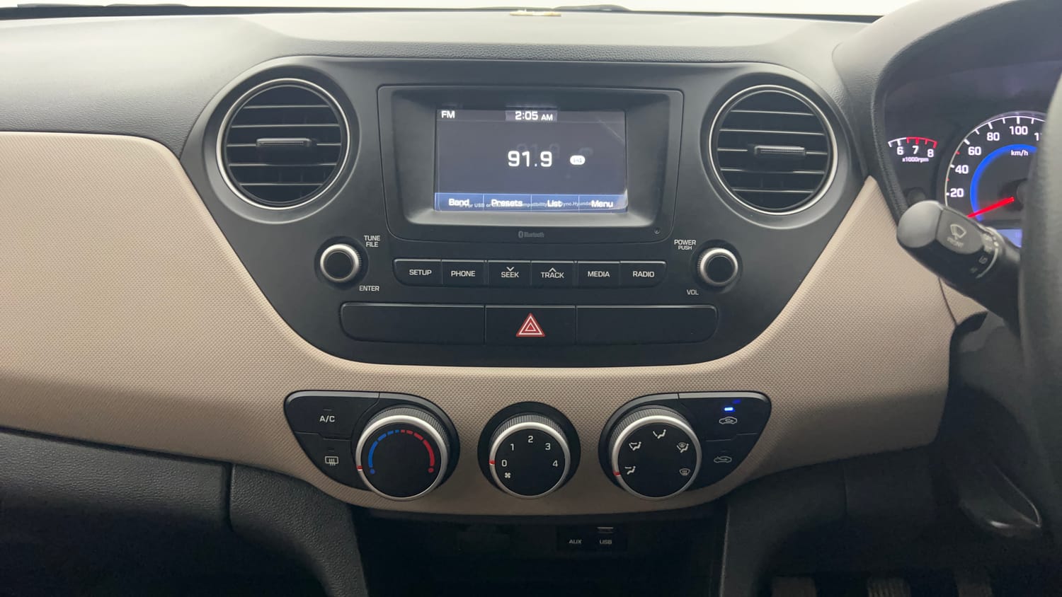 Used 2017 Hyundai Grand i10 Sportz 1.2 Kappa VTVT Petrol Manual interior MUSIC SYSTEM & AC CONTROL VIEW