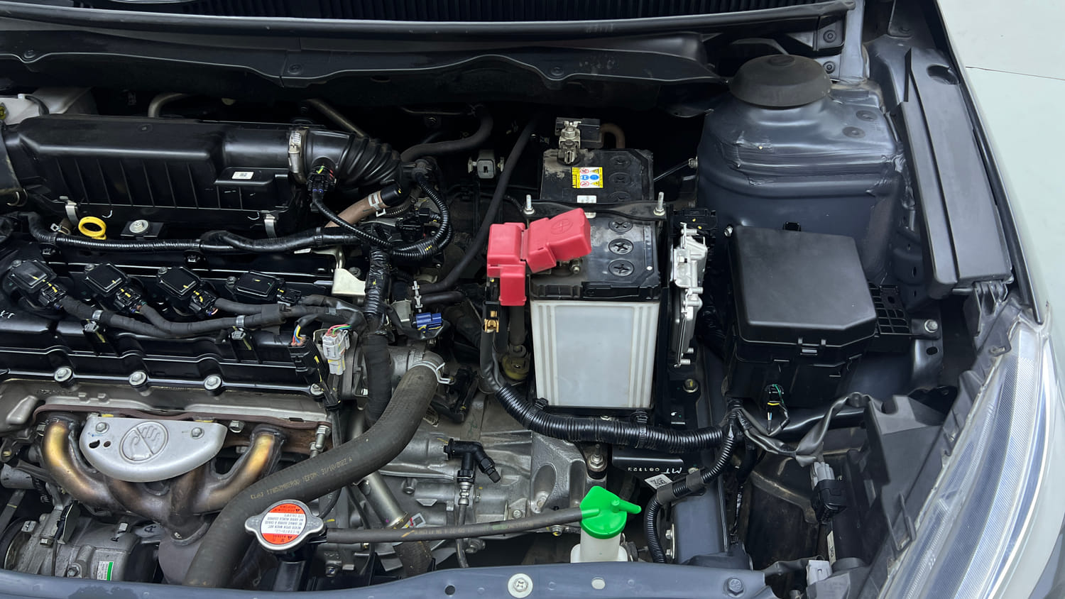 Used 2022 Maruti Suzuki Ciaz Zeta 1.5 Petrol Manual engine ENGINE LEFT SIDE VIEW