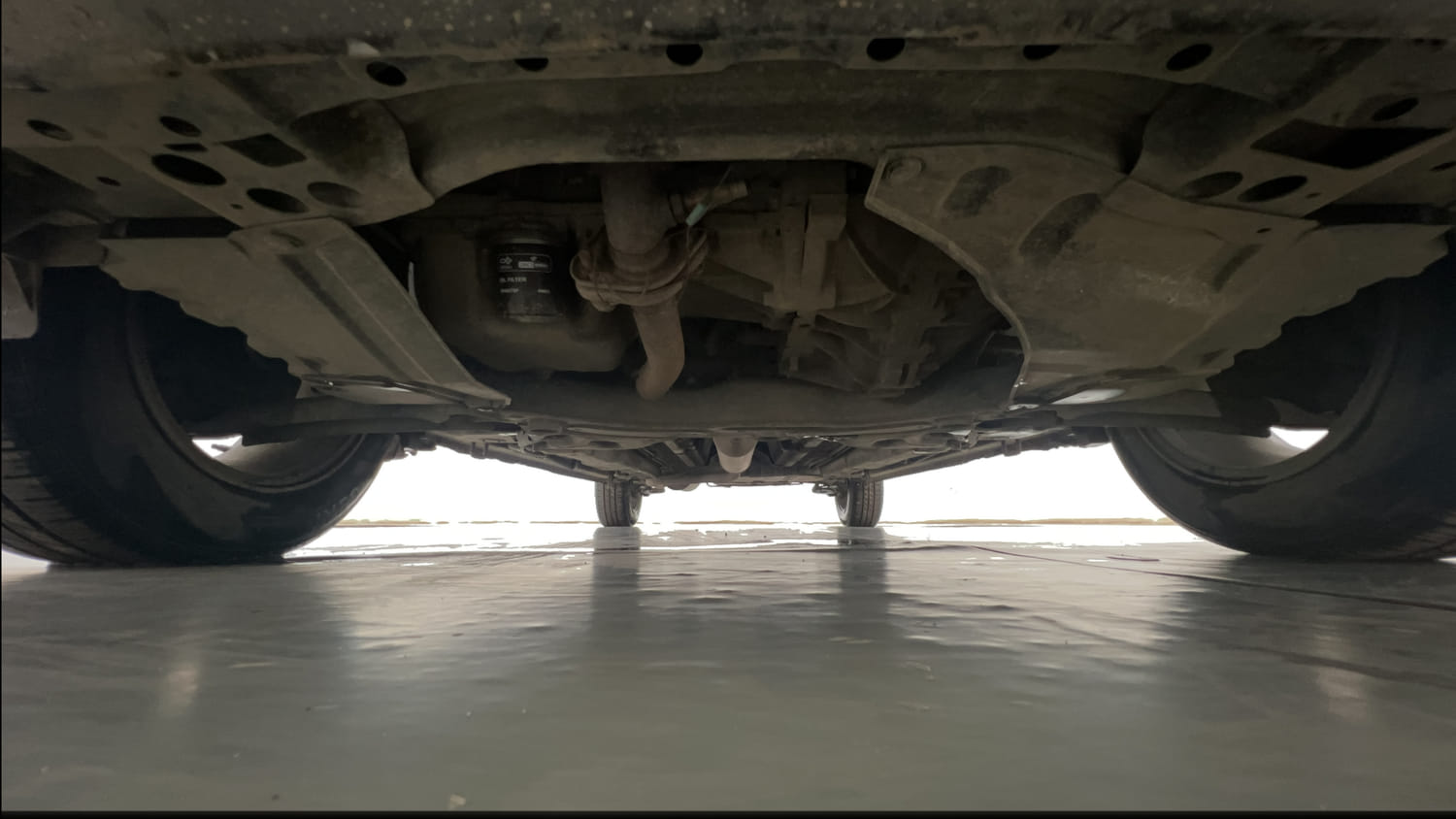 Used 2013 Maruti Suzuki Ertiga Vxi Petrol Manual extra FRONT LEFT UNDERBODY VIEW