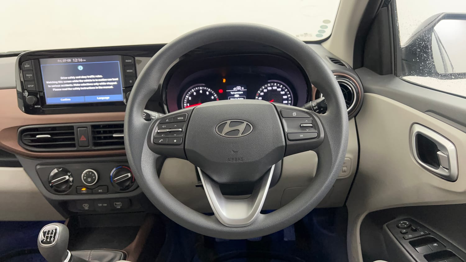 Used 2023 Hyundai Aura SX 1.2 CNG Cng Manual interior STEERING VIEW