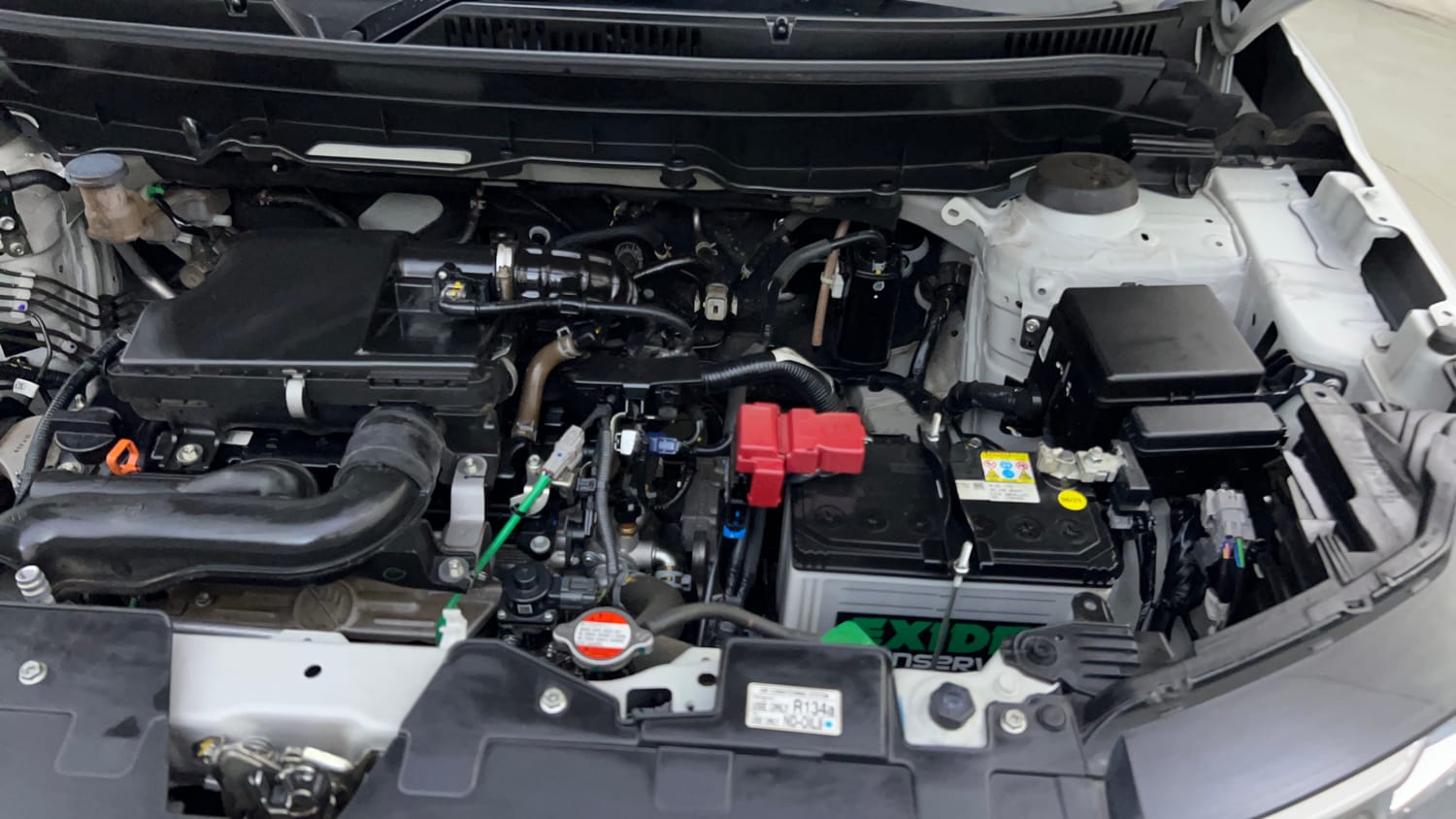 Used 2025 Maruti Suzuki Brezza Vxi AT Petrol Automatic engine ENGINE LEFT SIDE VIEW