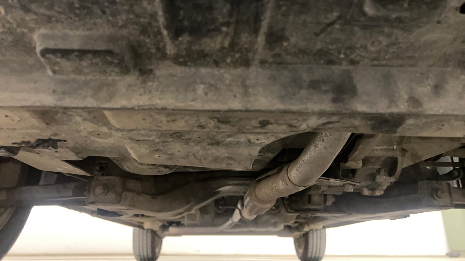 Used 2015 Tata Zest XT Petrol Petrol Manual extra FRONT LEFT UNDERBODY VIEW