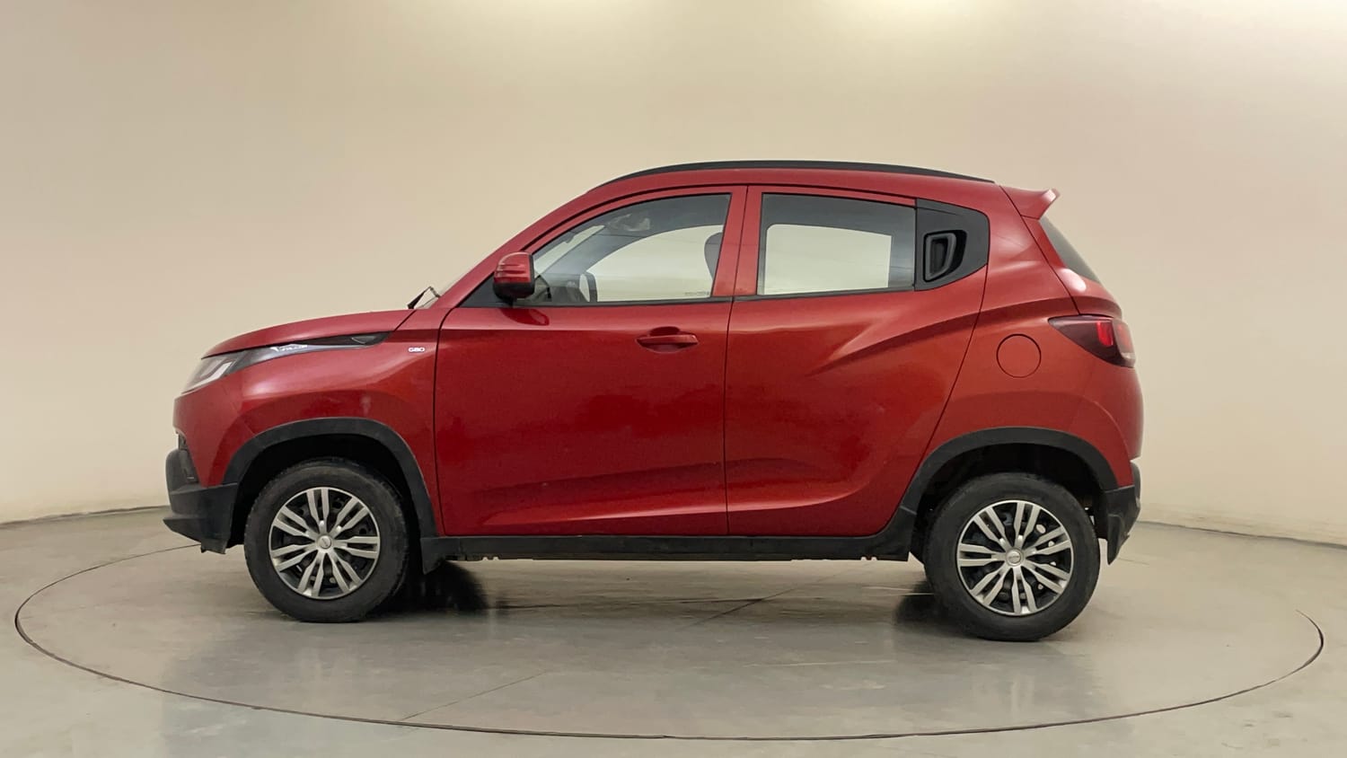 Used 2016 Mahindra KUV100 K4 6 STR Petrol Manual exterior LEFT SIDE VIEW