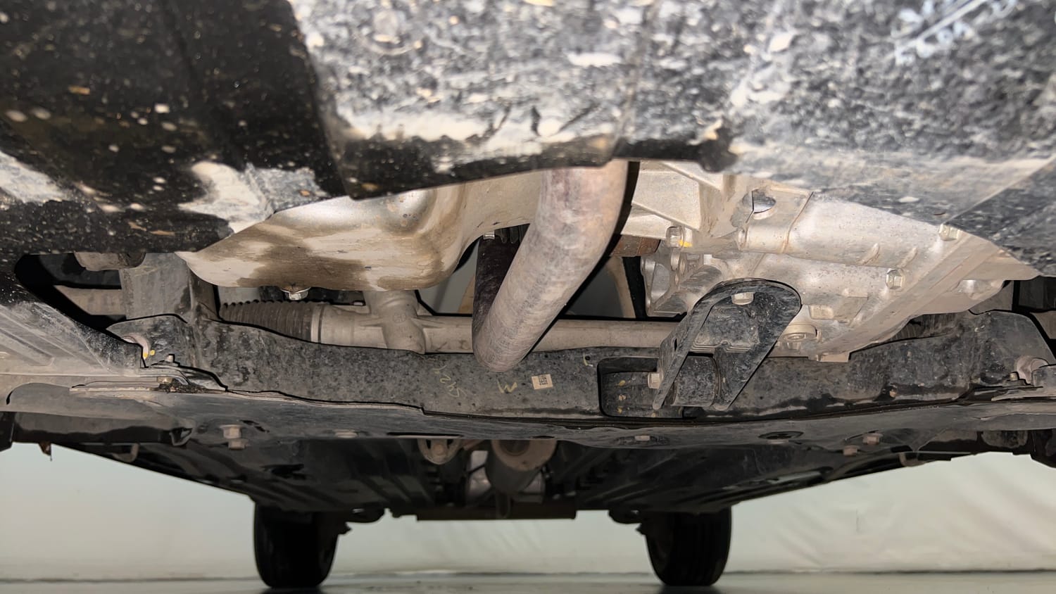 Used 2025 Maruti Suzuki Brezza Vxi AT Petrol Automatic extra FRONT LEFT UNDERBODY VIEW
