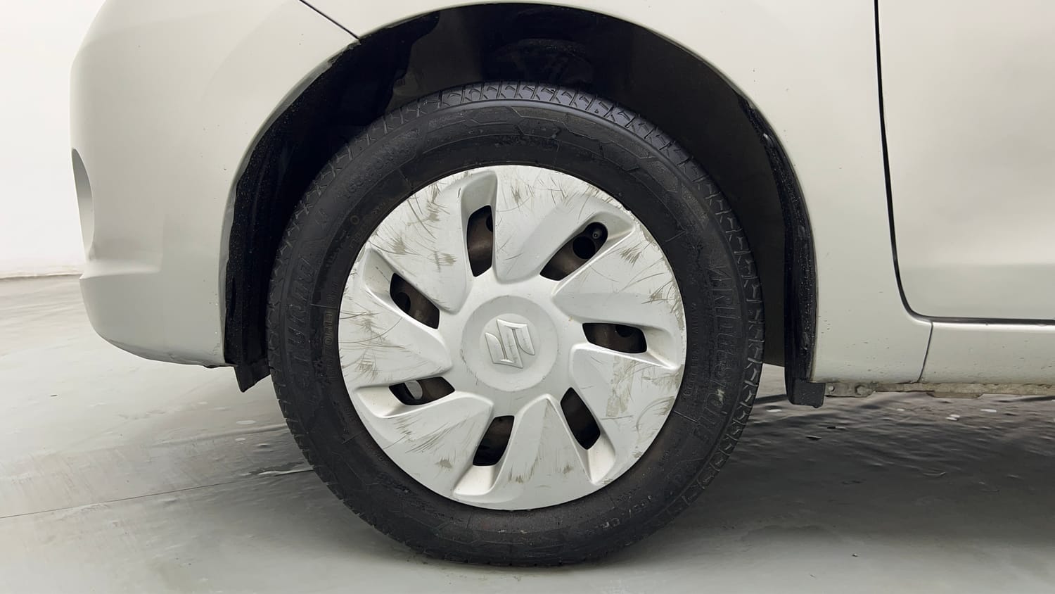 Used 2014 Maruti Suzuki Celerio VXi AMT Petrol Automatic tyres LEFT FRONT TYRE RIM VIEW